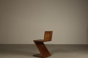 Set_of_4_Handcrafted_Zig-Zag_Chairs_After_Gerrit_Rietveld_in_Dark-Stained_Solid_Wood