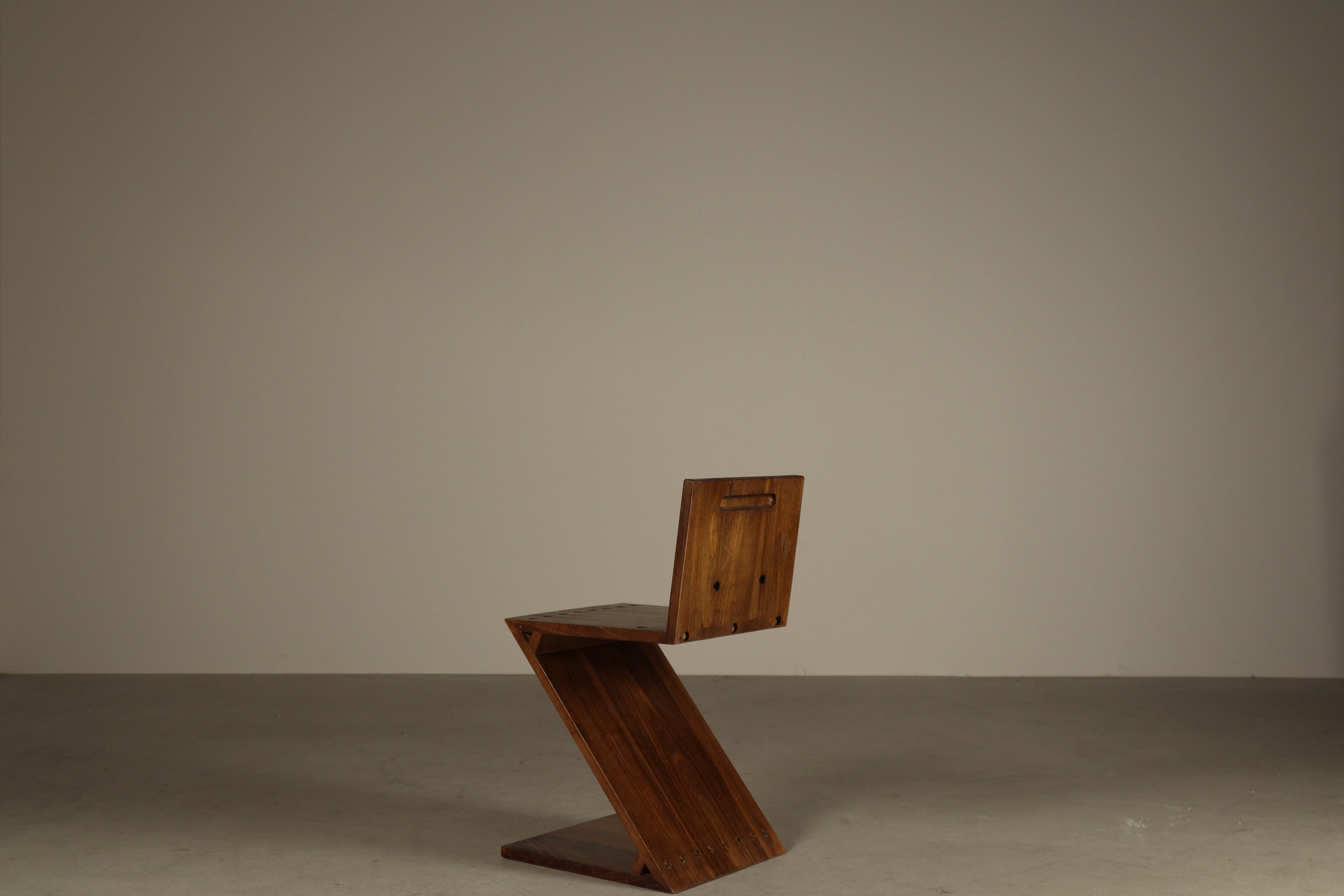 Set_of_4_Handcrafted_Zig-Zag_Chairs_After_Gerrit_Rietveld_in_Dark-Stained_Solid_Wood