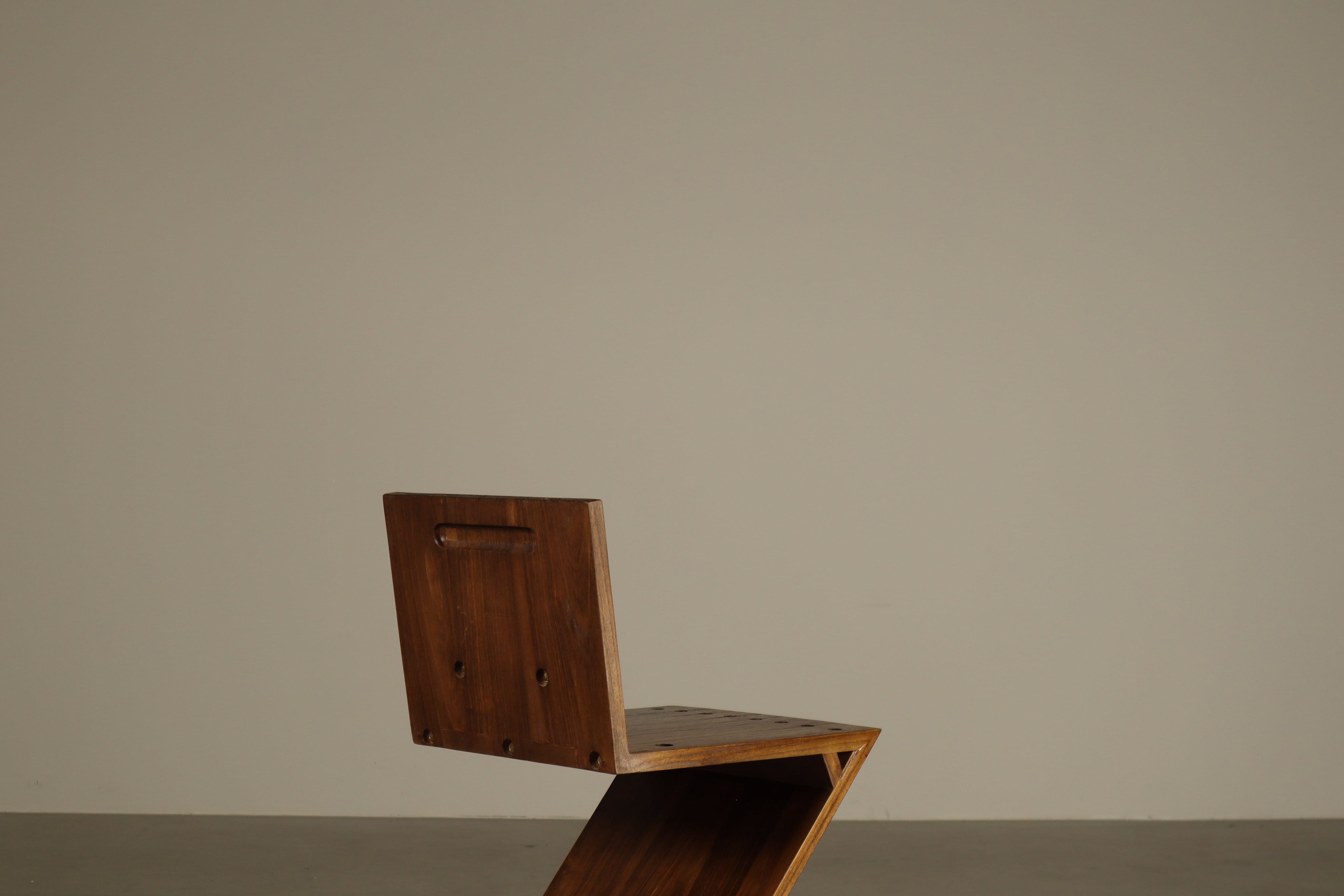 Set_of_4_Handcrafted_Zig-Zag_Chairs_After_Gerrit_Rietveld_in_Dark-Stained_Solid_Wood