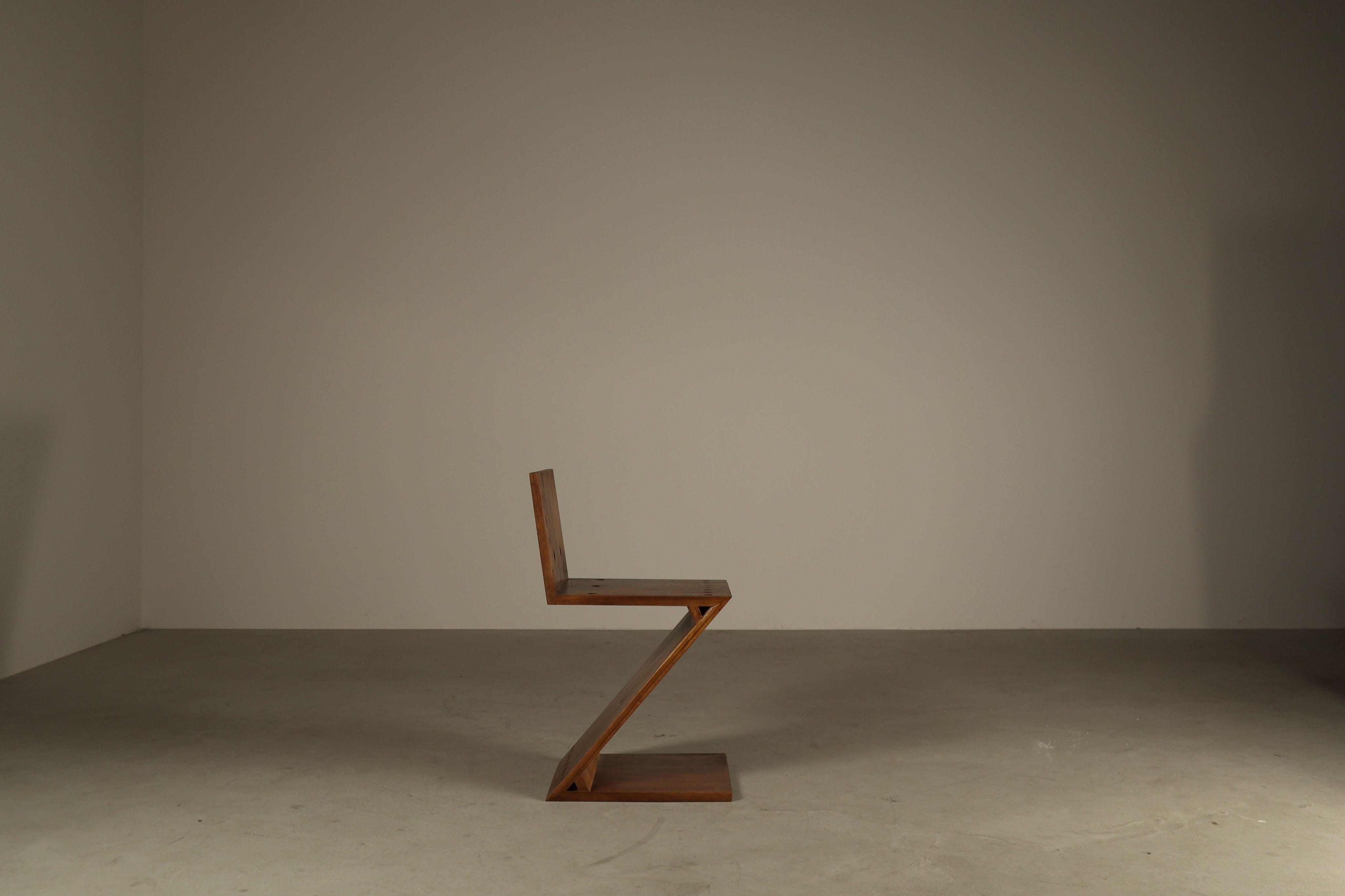 Set_of_4_Handcrafted_Zig-Zag_Chairs_After_Gerrit_Rietveld_in_Dark-Stained_Solid_Wood