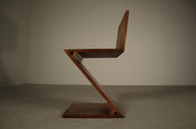 Set_of_4_Handcrafted_Zig-Zag_Chairs_After_Gerrit_Rietveld_in_Dark-Stained_Solid_Wood