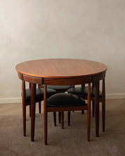 Set_of_Hans_Olsen_Roundette_Extendable_Teak_Dining_for_Frem_Røjle,_Denmark,_1950s