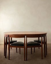 Set_of_Hans_Olsen_Roundette_Extendable_Teak_Dining_for_Frem_Røjle,_Denmark,_1950s