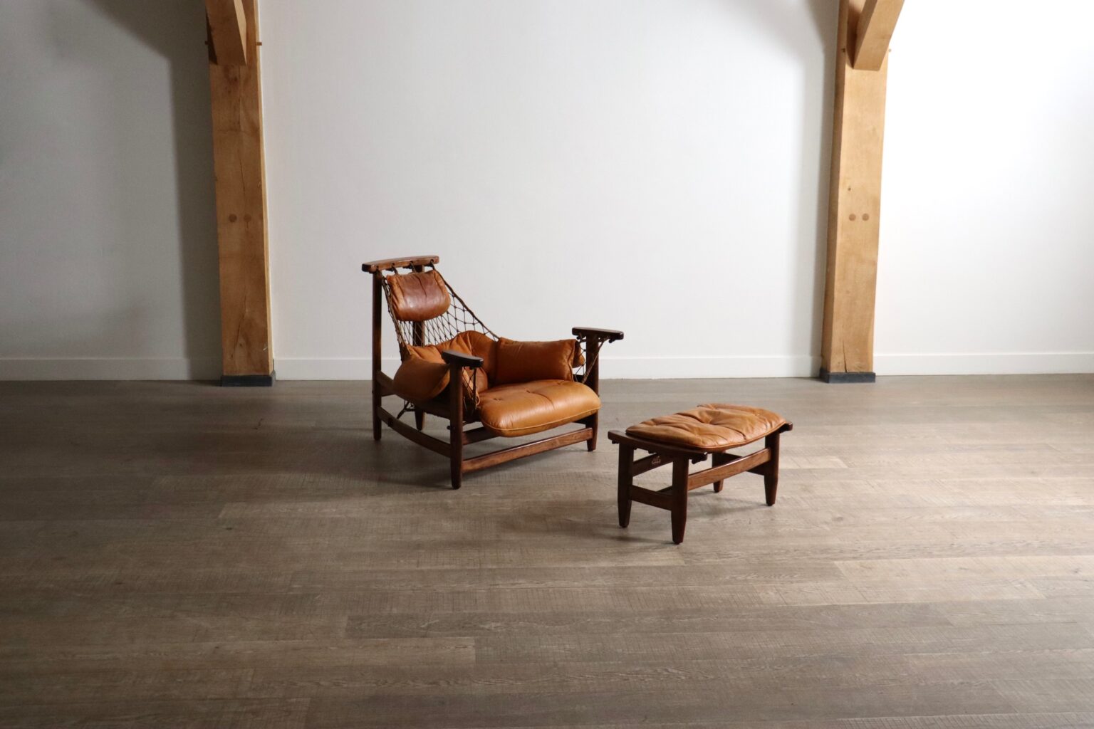 Set_of_Jean_Gillon_“Jangada”_Lounge_Chair_with_Ottoman_in_Cognac_Leather,_Brazil_1960s