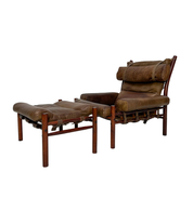 Set_of_Leather_Lounge_Chair_and_Ottoman_by_Arne_Norell_for_Norell_Möbel_AB,_Buffalo_Leather_and_Wood,_Sweden,_1970s