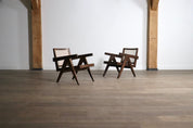 Set_of_2_Pierre_Jeanneret_armchairs_PJ-SI-29-A_in_teak_and_Cane,_1950s