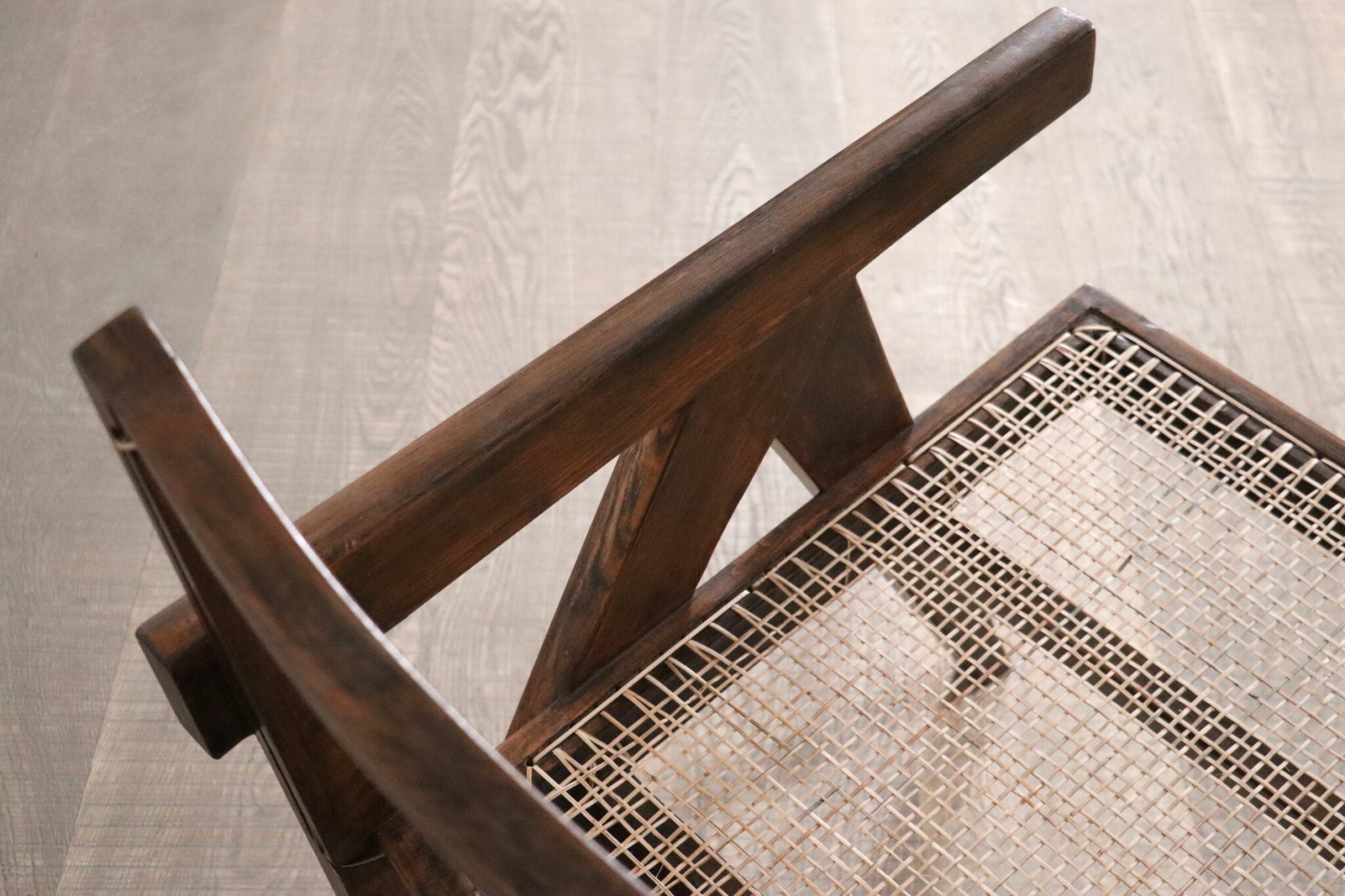 Set_of_2_Pierre_Jeanneret_armchairs_PJ-SI-29-A_in_teak_and_Cane,_1950s