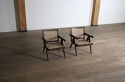Set_of_2_Pierre_Jeanneret_armchairs_PJ-SI-29-A_in_teak_and_Cane,_1950s