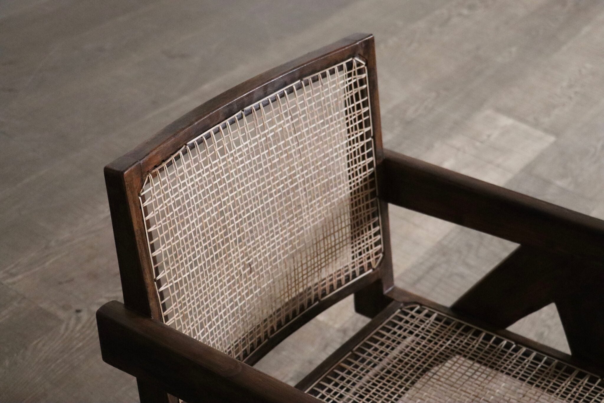 Set_of_2_Pierre_Jeanneret_armchairs_PJ-SI-29-A_in_teak_and_Cane,_1950s