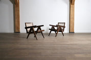 Set_of_2_Pierre_Jeanneret_armchairs_PJ-SI-29-A_in_teak_and_Cane,_1950s