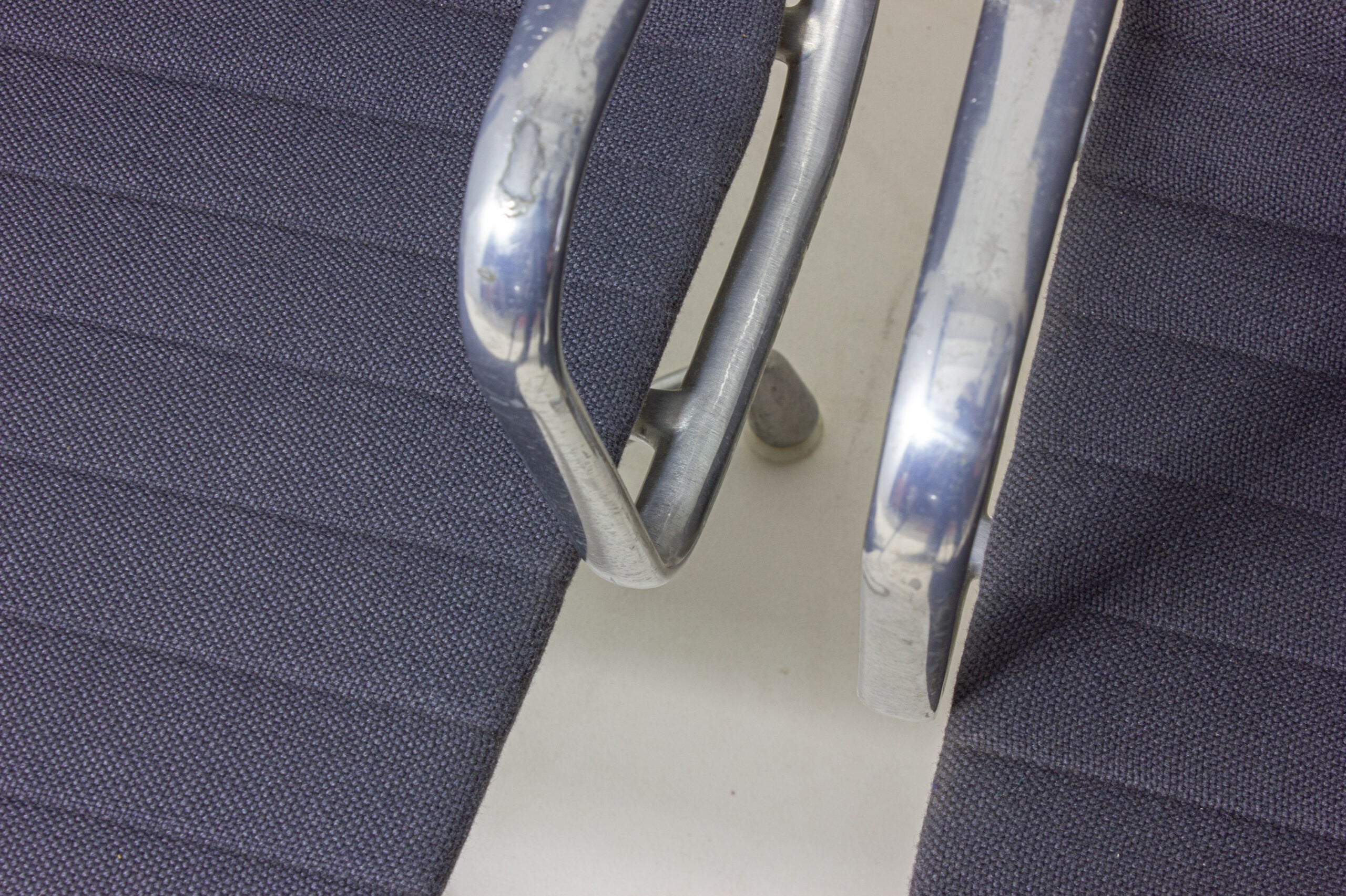 Set_of_6_Eames_EA109_Aluminum_Group_Chairs_for_Herman_Miller,_1980s
