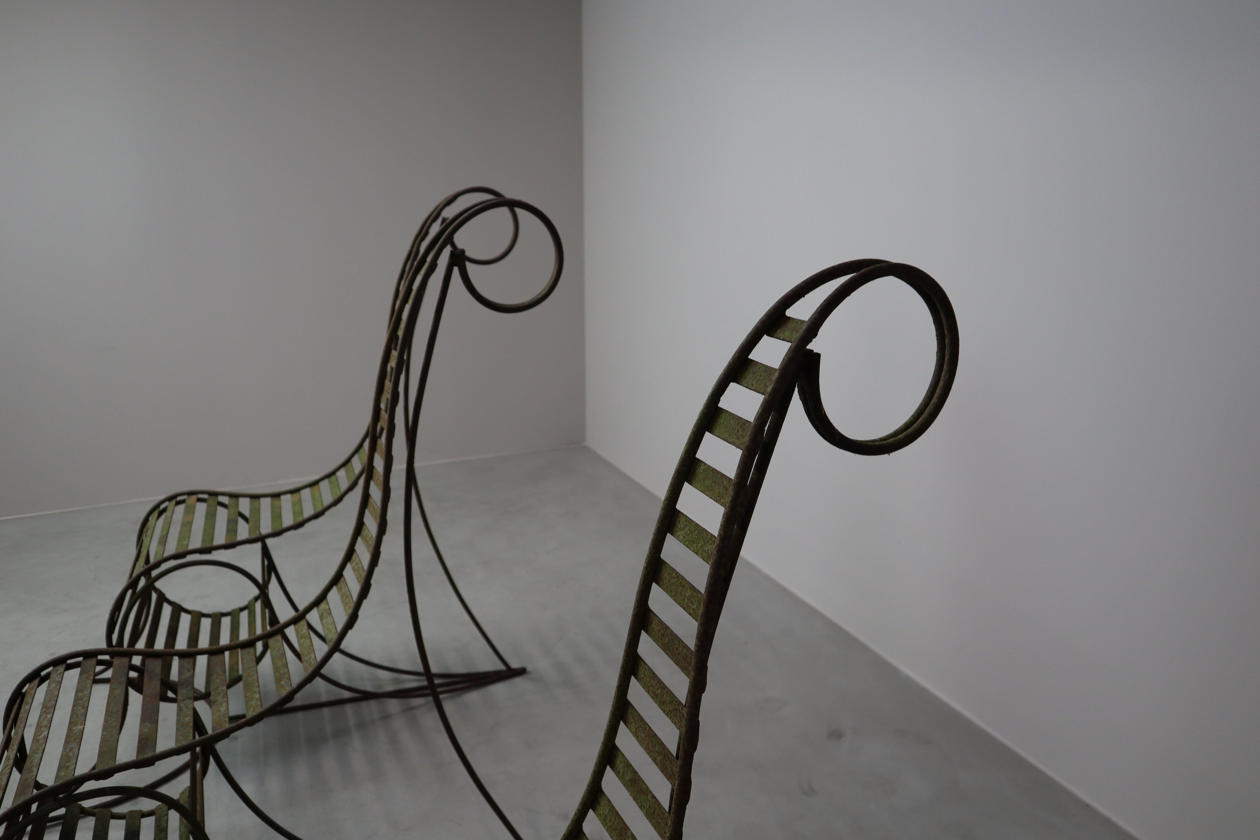 Set_of_3_sculptural_iron_chairs,_in_the_style_of_André_Dubreuil