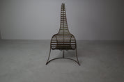Set_of_3_sculptural_iron_chairs,_in_the_style_of_André_Dubreuil