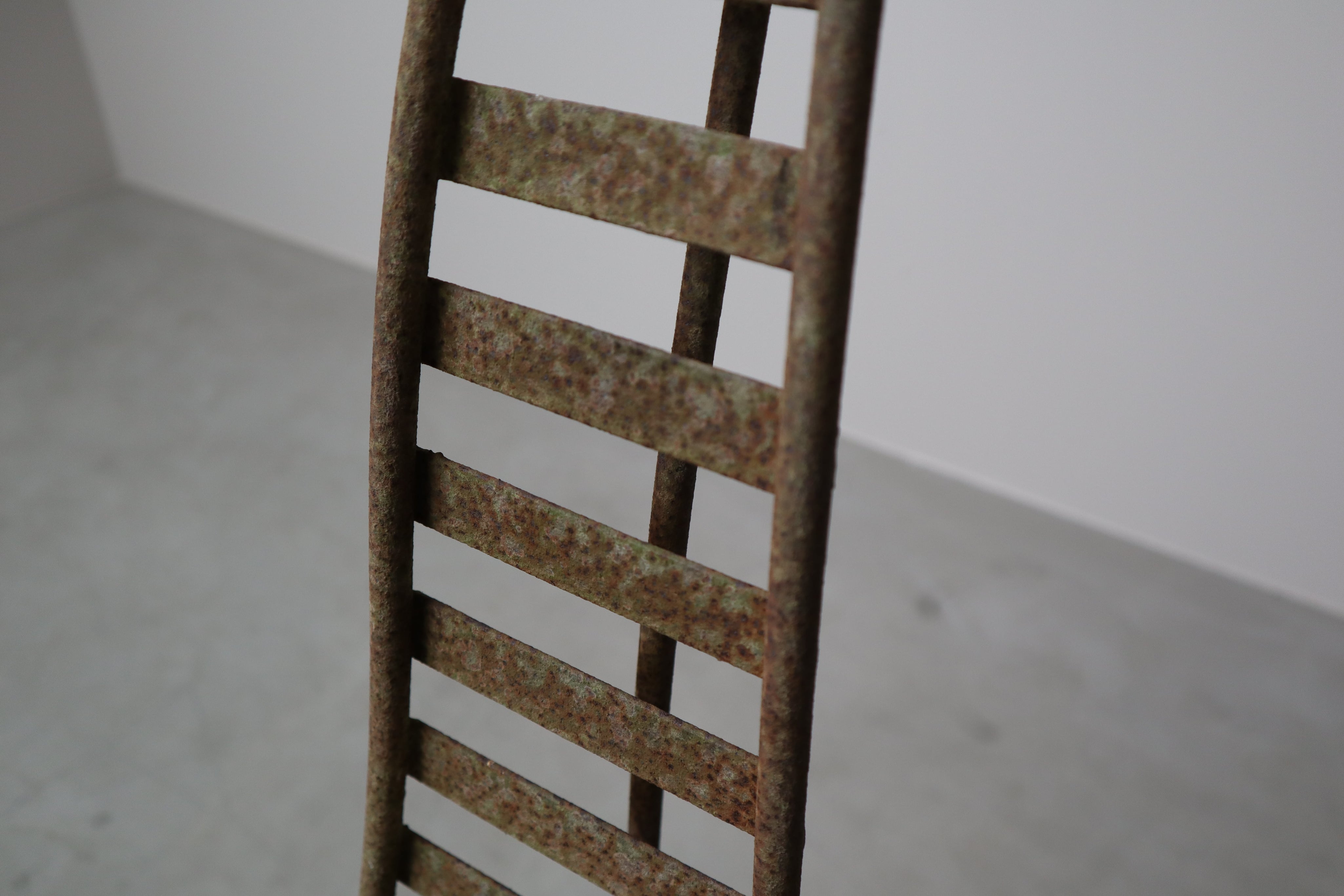 Set_of_3_sculptural_iron_chairs,_in_the_style_of_André_Dubreuil