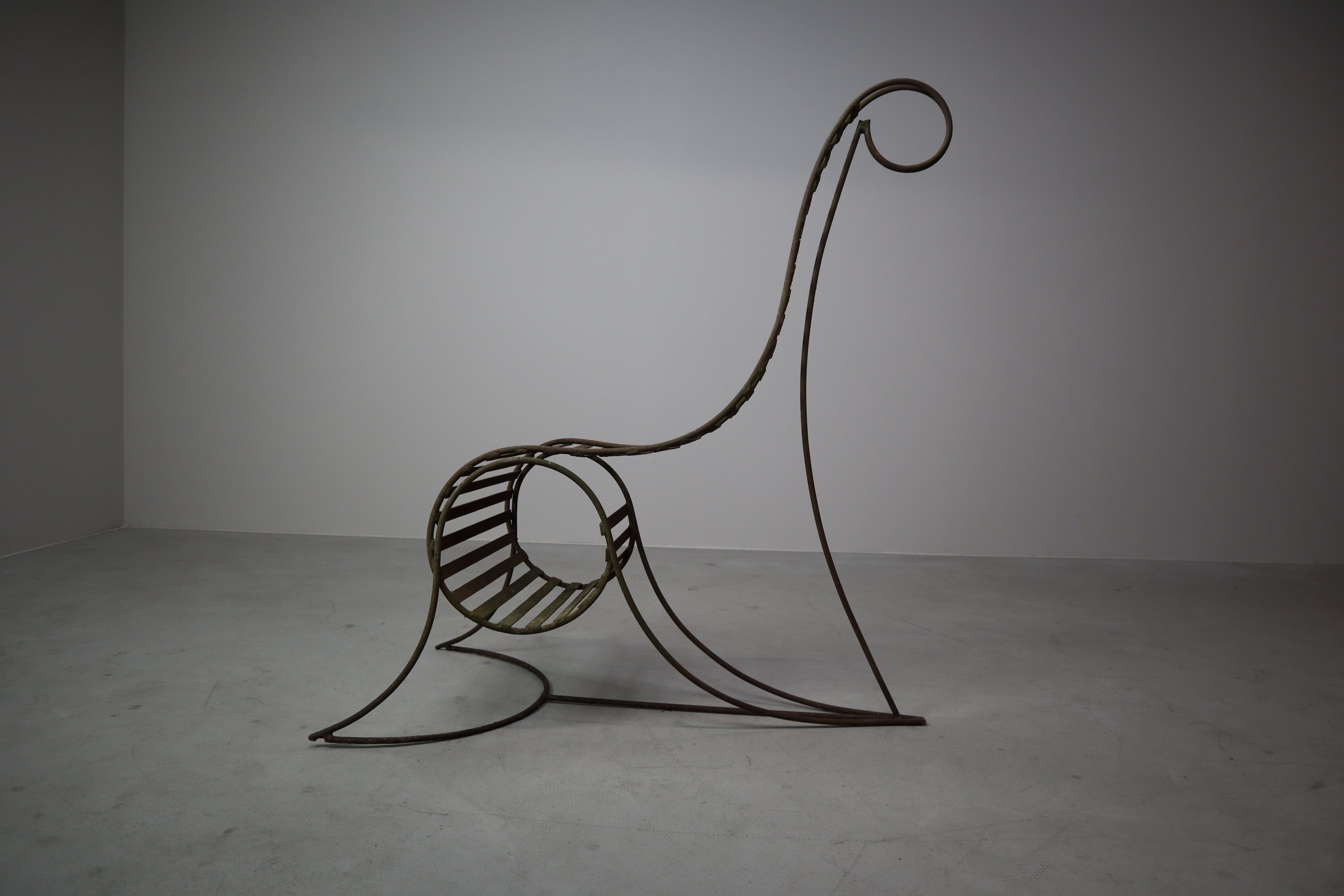 Set_of_3_sculptural_iron_chairs,_in_the_style_of_André_Dubreuil