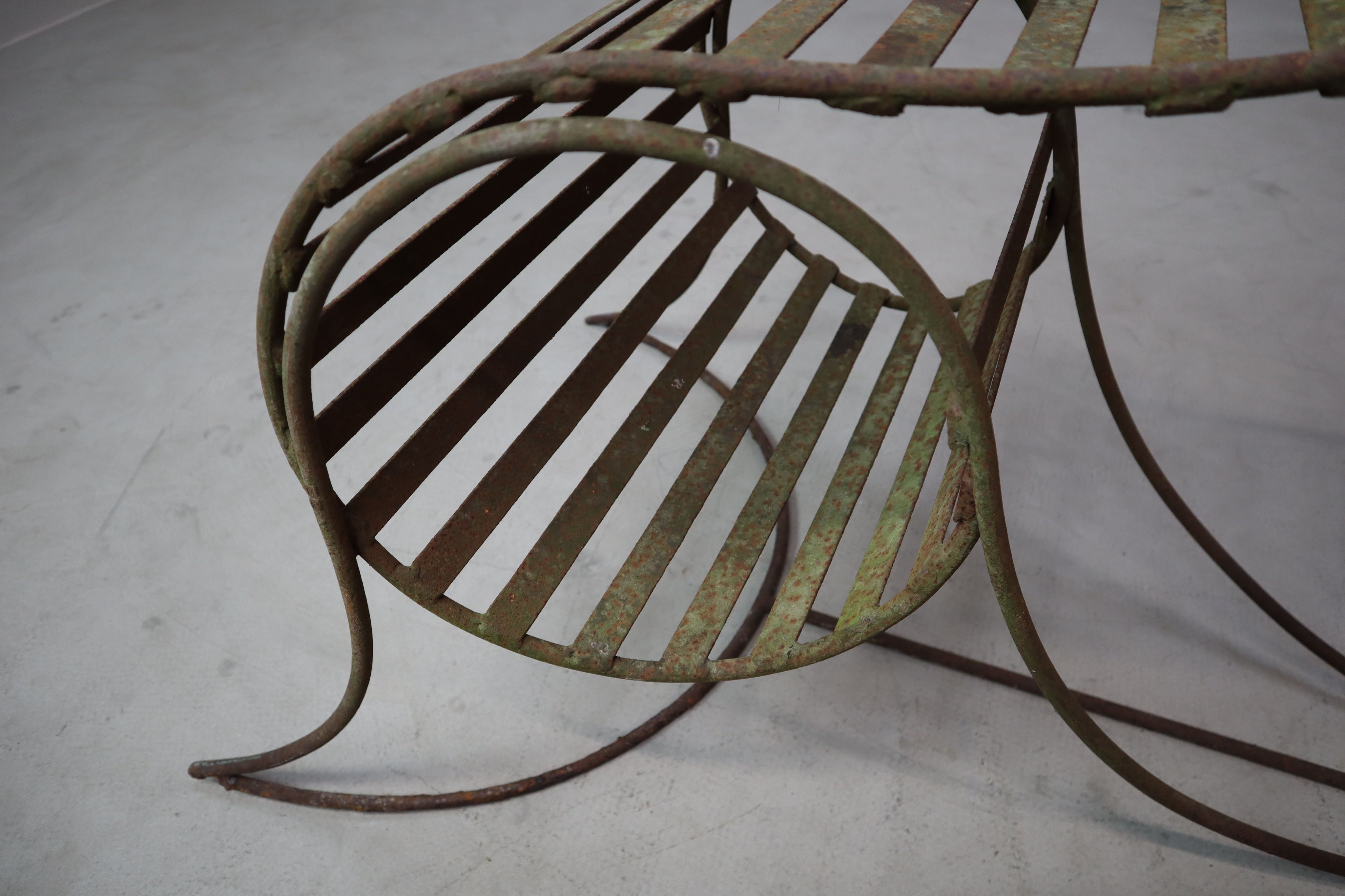 Set_of_3_sculptural_iron_chairs,_in_the_style_of_André_Dubreuil