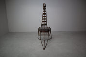 Set_of_3_sculptural_iron_chairs,_in_the_style_of_André_Dubreuil