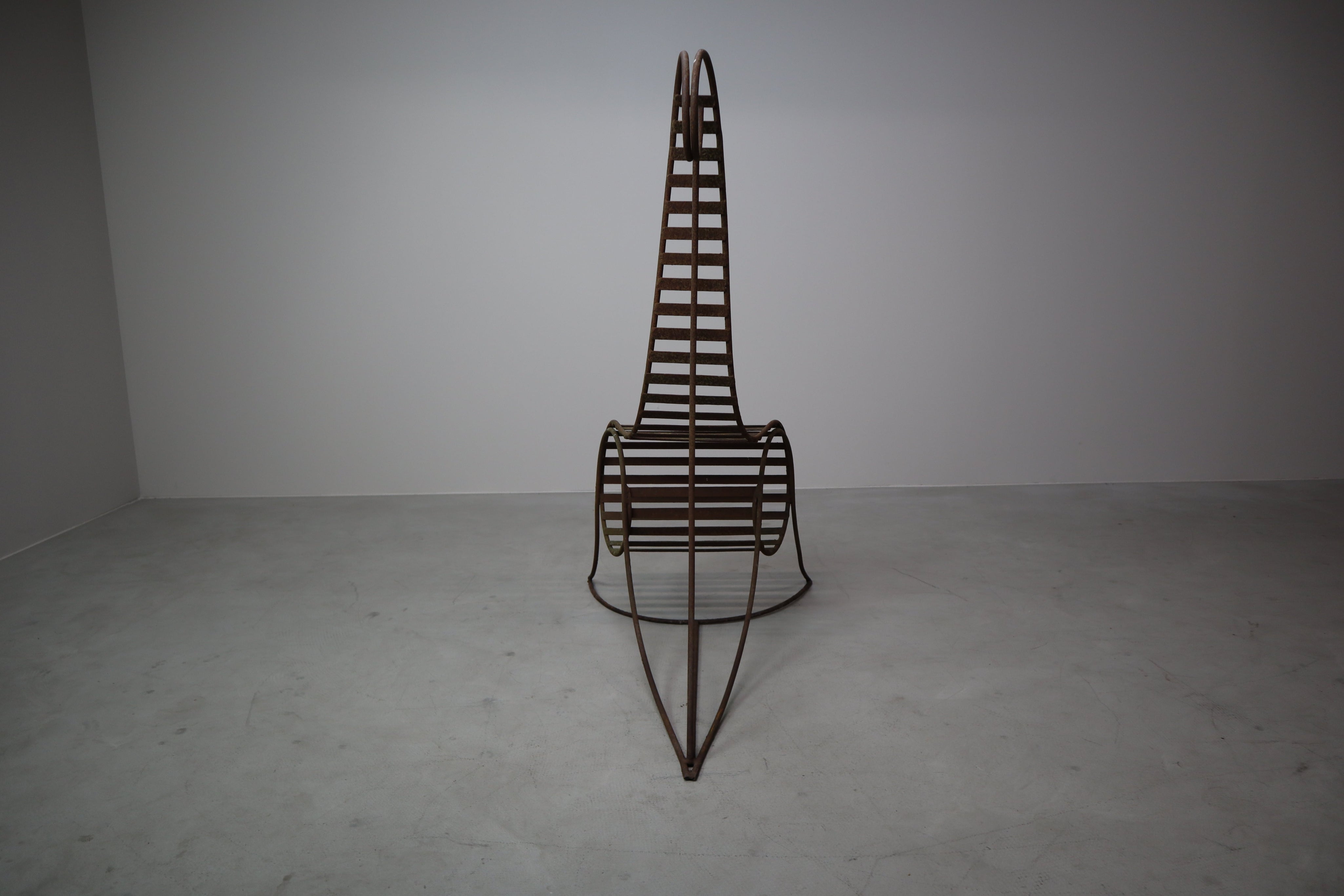 Set_of_3_sculptural_iron_chairs,_in_the_style_of_André_Dubreuil