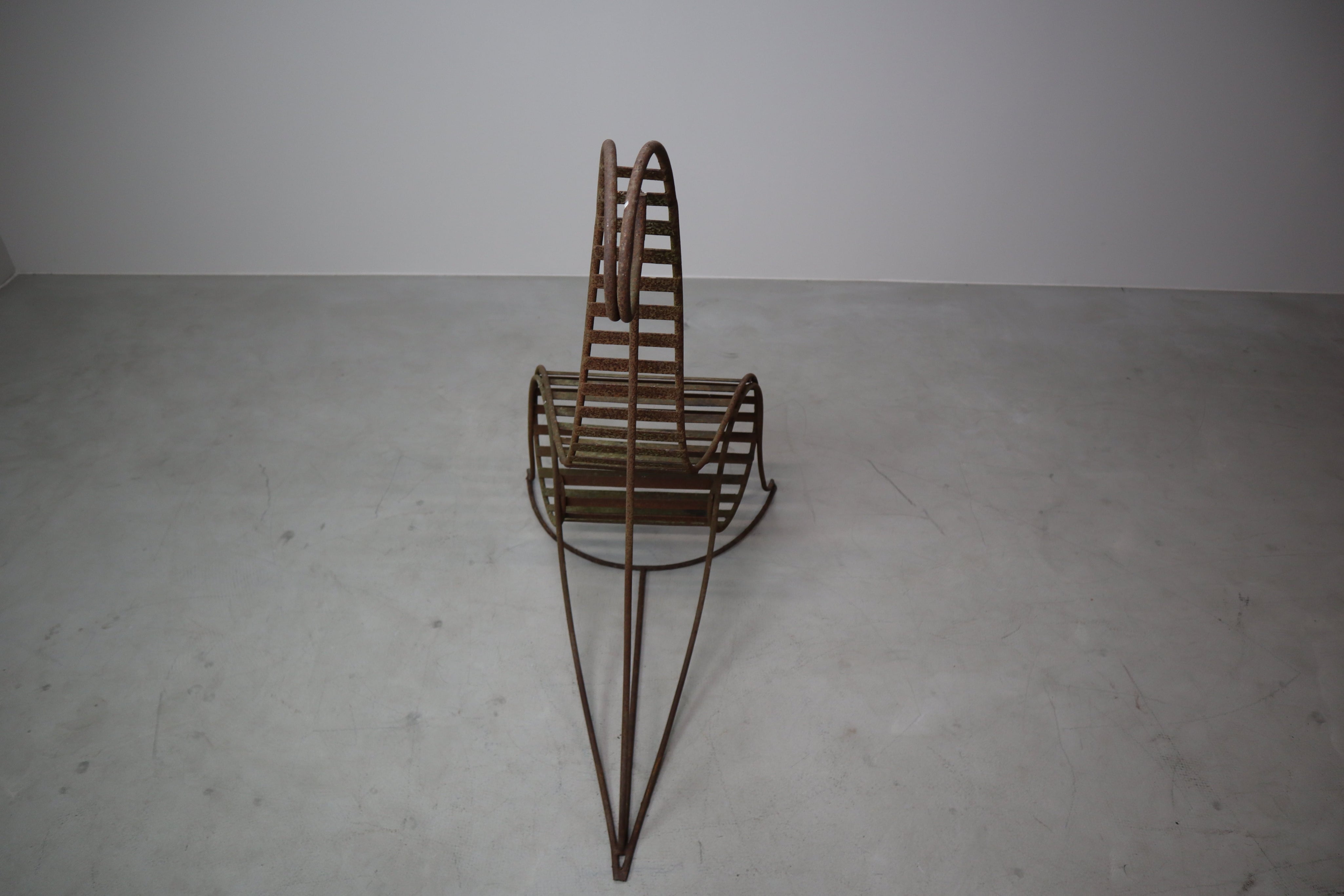 Set_of_3_sculptural_iron_chairs,_in_the_style_of_André_Dubreuil