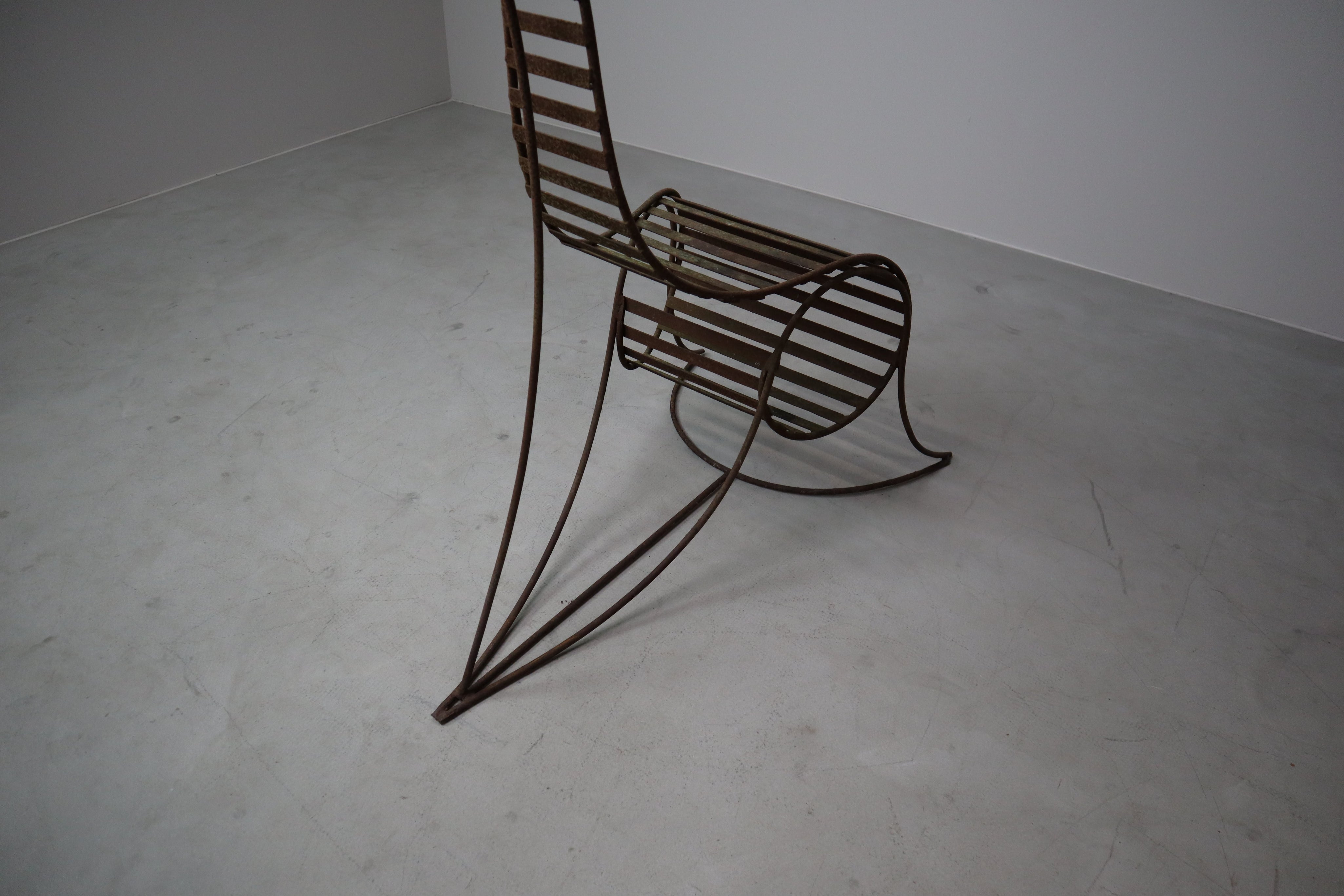 Set_of_3_sculptural_iron_chairs,_in_the_style_of_André_Dubreuil