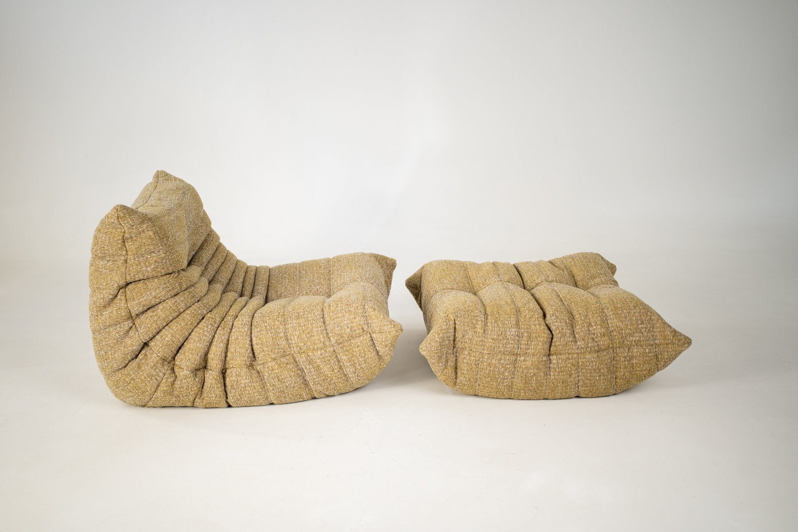 Set_of_Togo_Lounge_Chair_and_Pouf_by_Michel_Ducaroy_for_Ligne_Roset,_Caramel_Loop_Fabric,_France,_1975