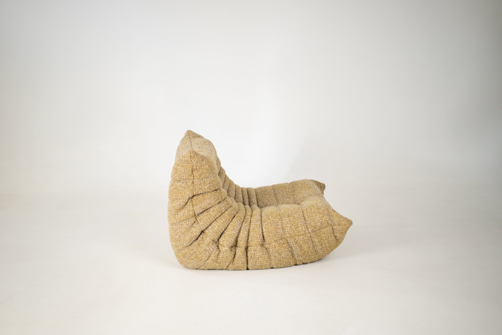 Set_of_Togo_Lounge_Chair_and_Pouf_by_Michel_Ducaroy_for_Ligne_Roset,_Caramel_Loop_Fabric,_France,_1975