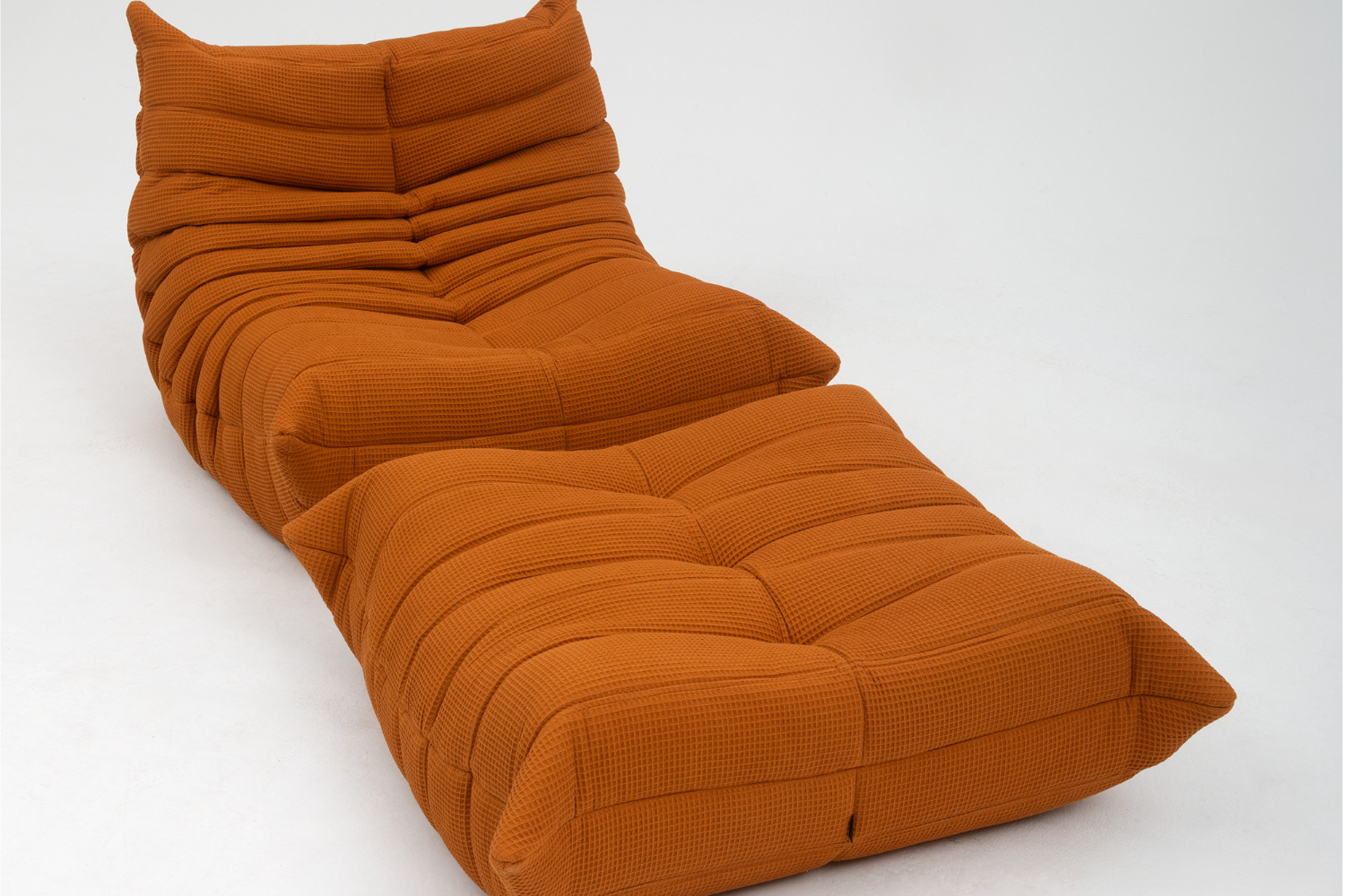 Set_of_Togo_Lounge_Chair_and_Pouf_by_Michel_Ducaroy_for_Ligne_Roset,_Orange_Fabric,_France,_1975