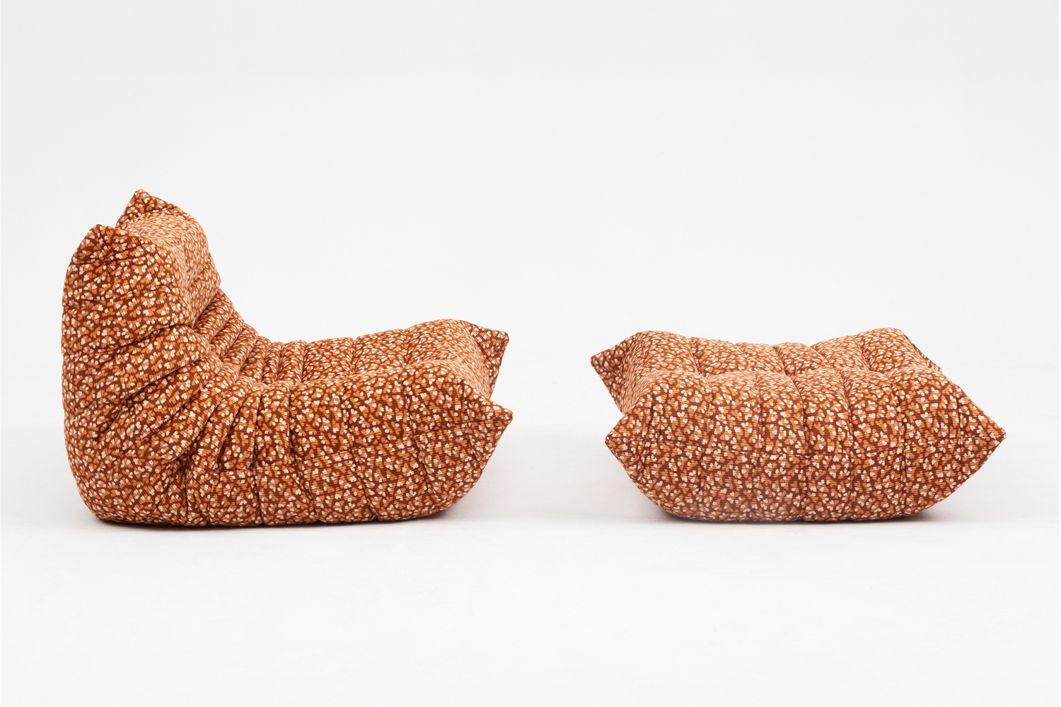 Set_of_Togo_Lounge_Chair_and_Pouf_by_Michel_Ducaroy_for_Ligne_Roset,_Orange_pattern,_France,_1976