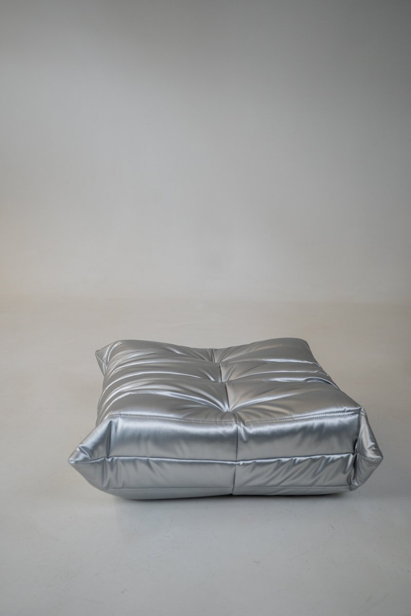 Set_of_Togo_Lounge_Chair_and_Pouf_by_Michel_Ducaroy_for_Ligne_Roset,_Silver_Skai,_France,_1973