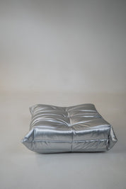 Set_of_Togo_Lounge_Chair_and_Pouf_by_Michel_Ducaroy_for_Ligne_Roset,_Silver_Skai,_France,_1973