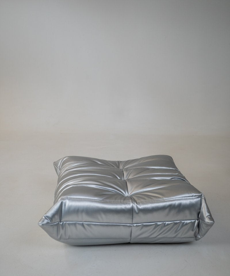 Set_of_Togo_Lounge_Chair_and_Pouf_by_Michel_Ducaroy_for_Ligne_Roset,_Silver_Skai,_France,_1973