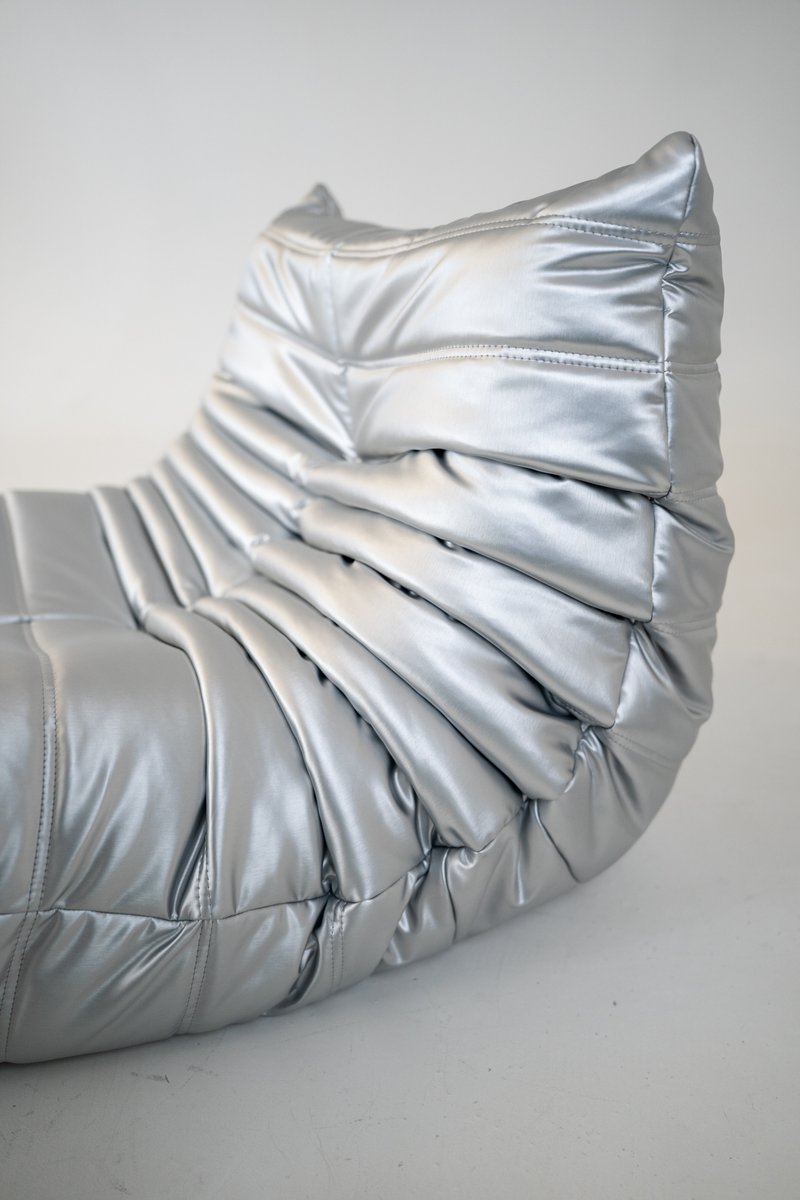 Set_of_Togo_Lounge_Chair_and_Pouf_by_Michel_Ducaroy_for_Ligne_Roset,_Silver_Skai,_France,_1973