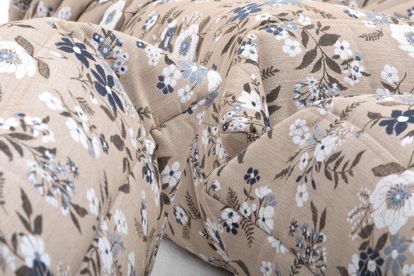 Set_of_Togo_Lounge_Chair,_Two-Seater_Sofa_and_Pouf_by_Michel_Ducaroy_for_Ligne_Roset,_Pattern_Fabric,_France,_1970s