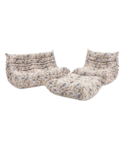 Set_of_Togo_Lounge_Chair,_Two-Seater_Sofa_and_Pouf_by_Michel_Ducaroy_for_Ligne_Roset,_Pattern_Fabric,_France,_1970s