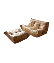 Set_of_Togo_Sofa_and_Pouf_by_Michel_Ducaroy_for_Ligne_Roset,_Camel_Brown_Leather,_France,_1973