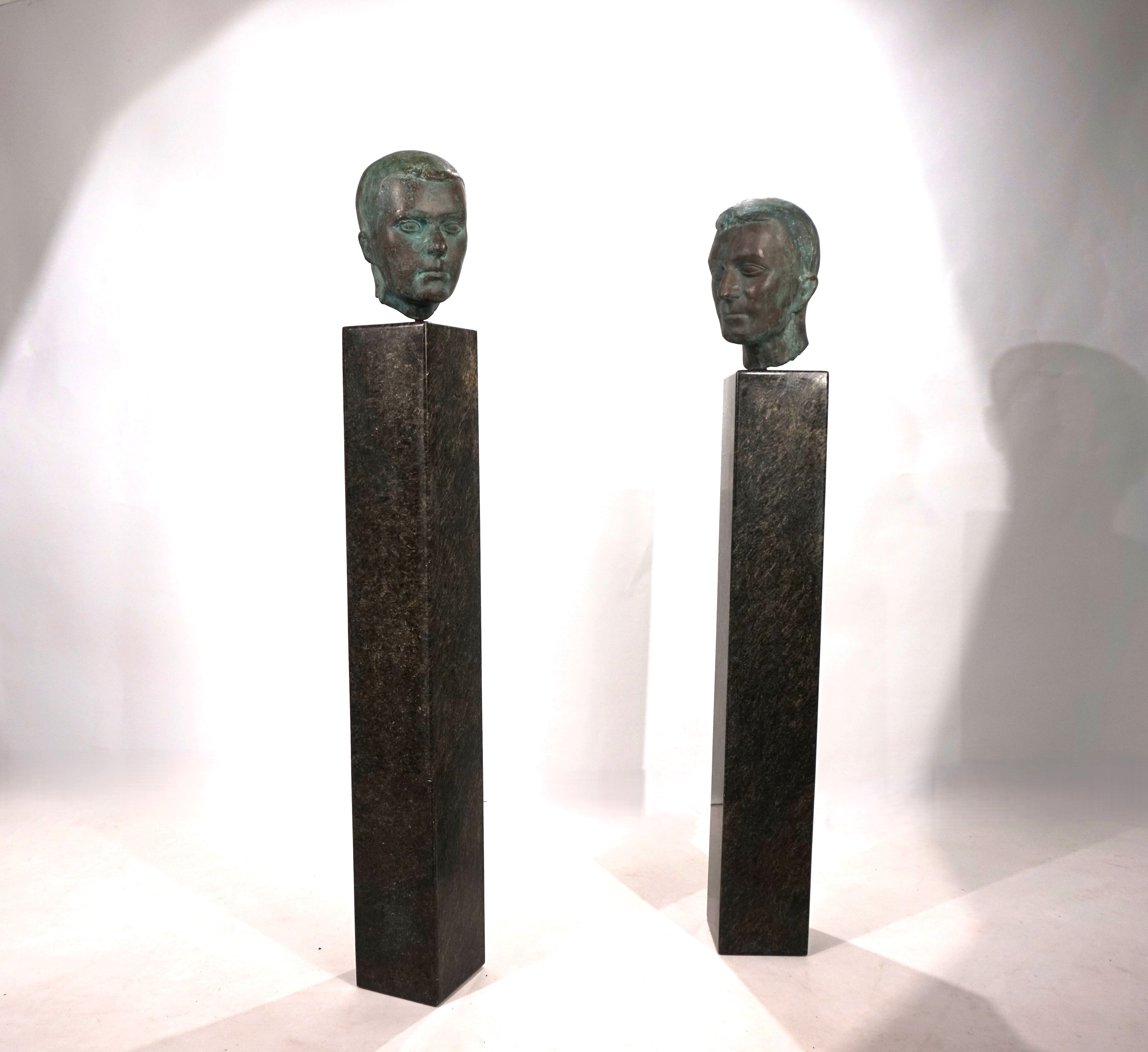 Set_of_2_Life-Size_Bronze_Male_Heads_on_Granite_Steles,_German_Bauhaus_Period,_circa_1920s