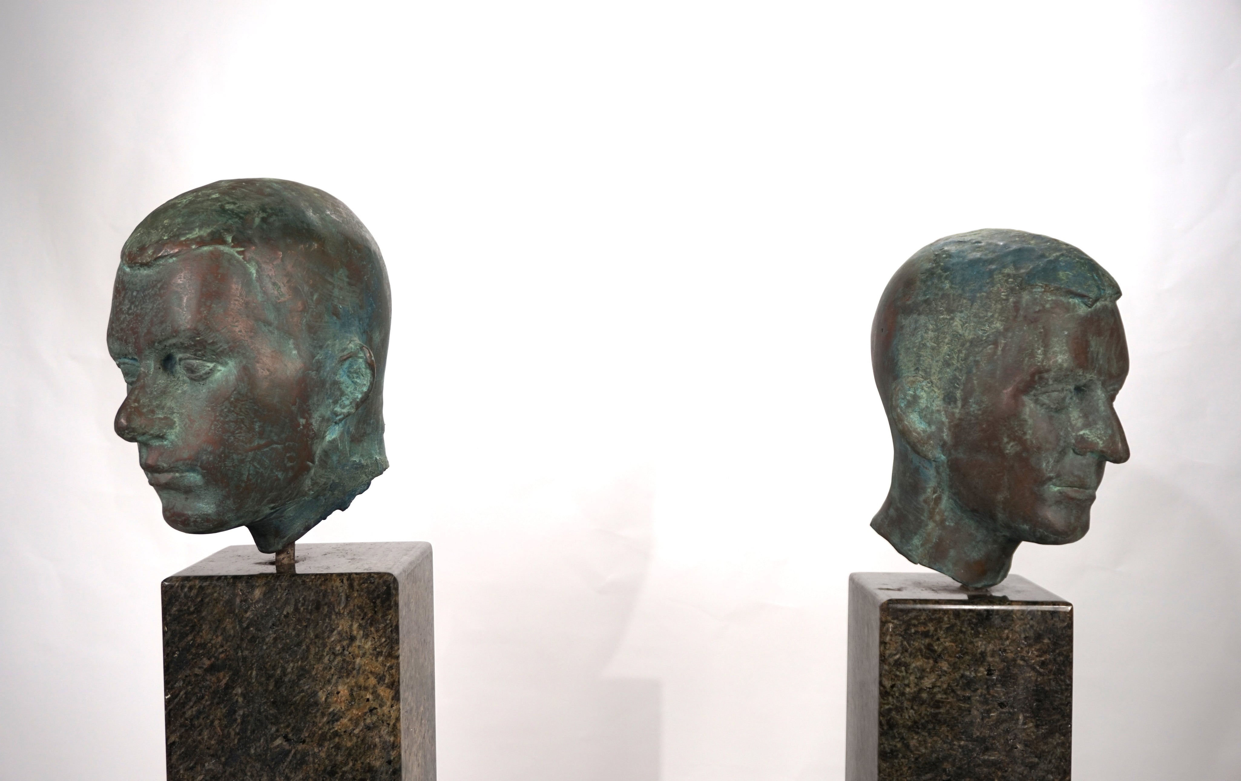 Set_of_2_Life-Size_Bronze_Male_Heads_on_Granite_Steles,_German_Bauhaus_Period,_circa_1920s