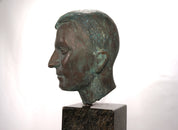 Set_of_2_Life-Size_Bronze_Male_Heads_on_Granite_Steles,_German_Bauhaus_Period,_circa_1920s