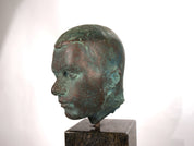 Set_of_2_Life-Size_Bronze_Male_Heads_on_Granite_Steles,_German_Bauhaus_Period,_circa_1920s