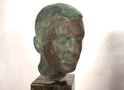 Set_of_2_Life-Size_Bronze_Male_Heads_on_Granite_Steles,_German_Bauhaus_Period,_circa_1920s