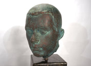 Set_of_2_Life-Size_Bronze_Male_Heads_on_Granite_Steles,_German_Bauhaus_Period,_circa_1920s