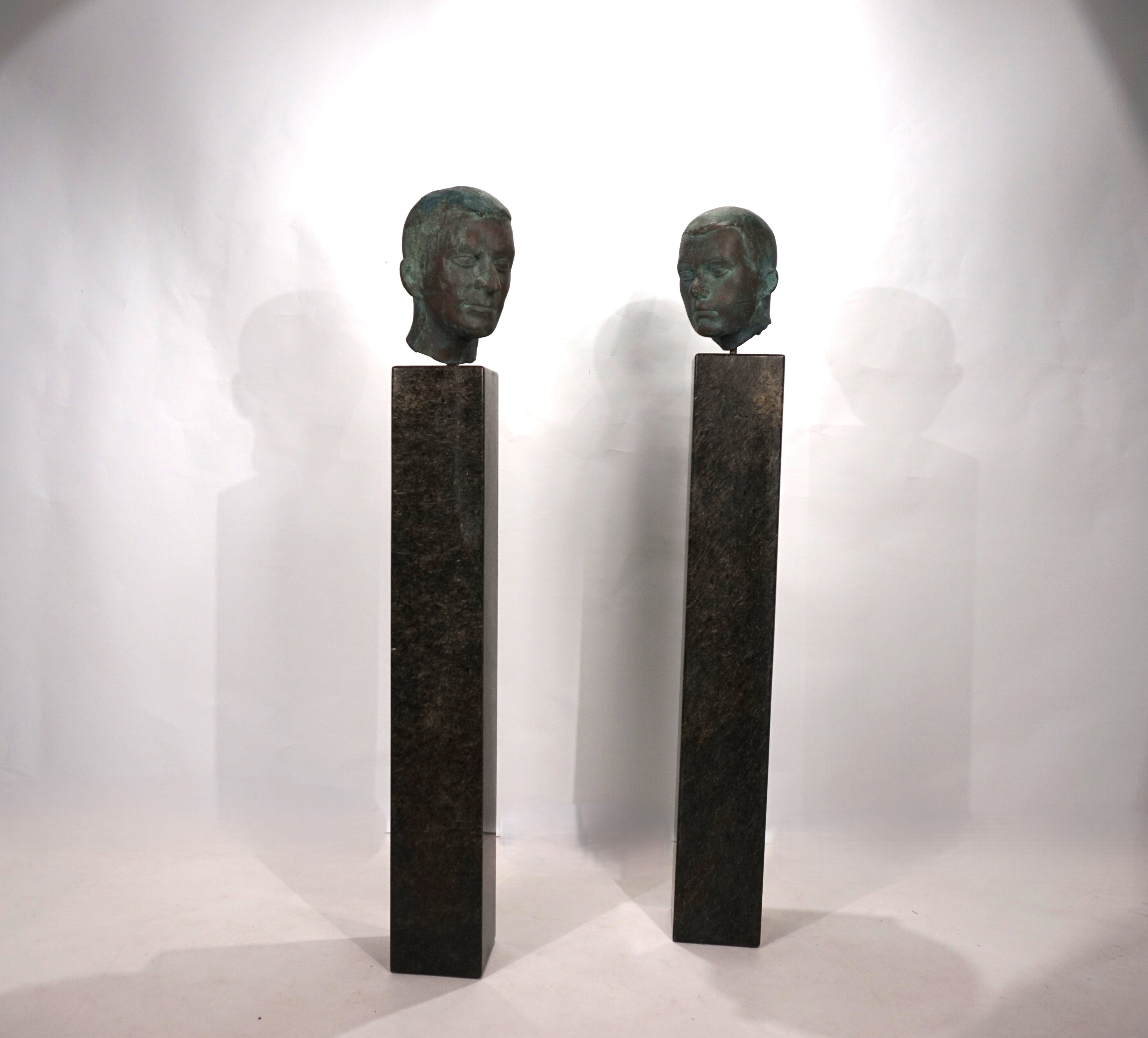 Set_of_2_Life-Size_Bronze_Male_Heads_on_Granite_Steles,_German_Bauhaus_Period,_circa_1920s