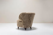 Set_of_2_Lounge_Chairs_Carl-Johan_Boman,_Sheepskin_And_Wood,_1940s_Finland