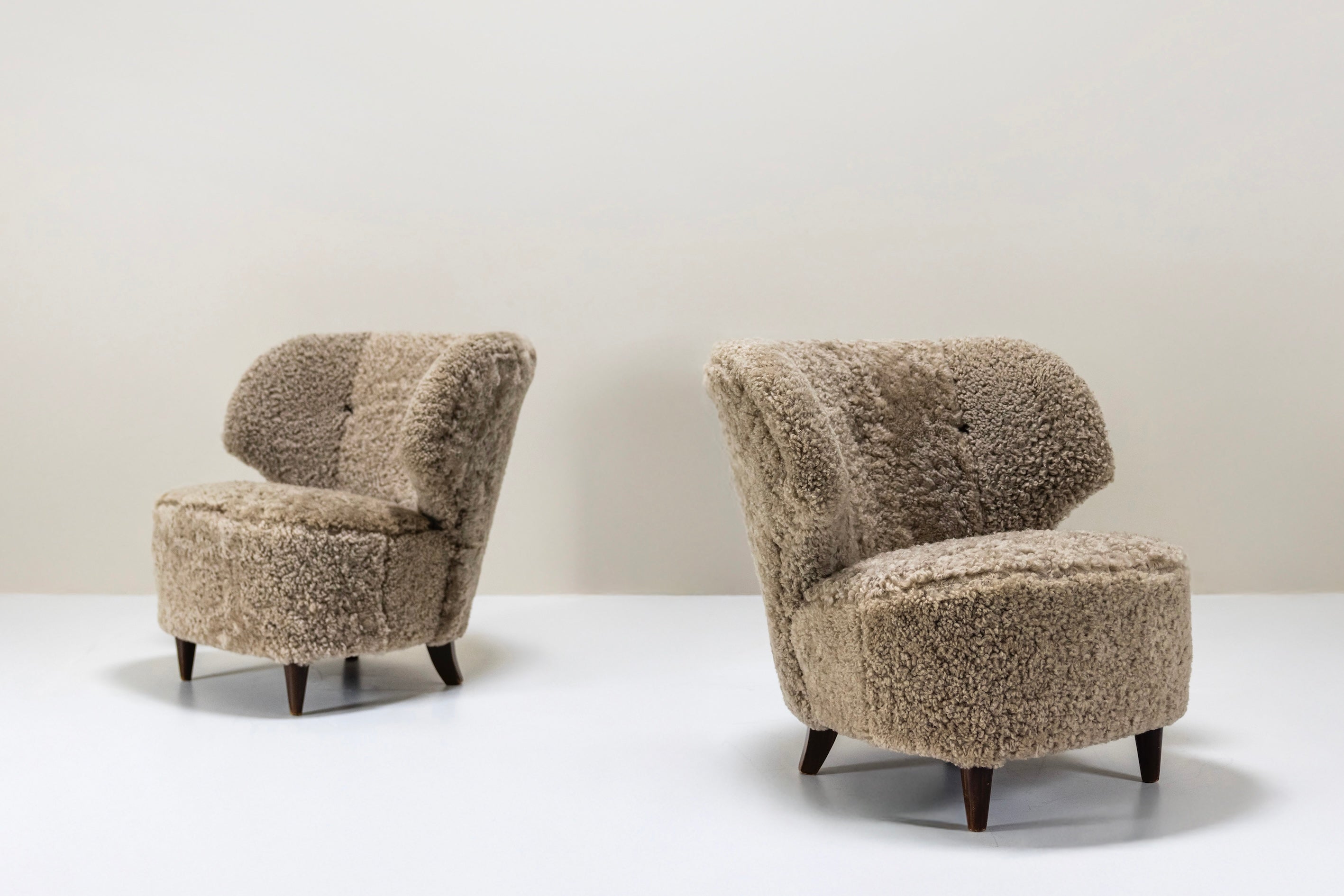 Set_of_2_Lounge_Chairs_Carl-Johan_Boman,_Sheepskin_And_Wood,_1940s_Finland