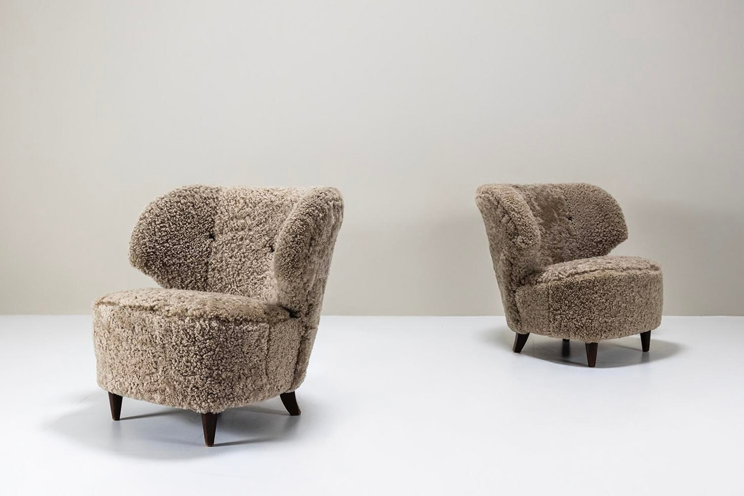 Set_of_2_Lounge_Chairs_Carl-Johan_Boman,_Sheepskin_And_Wood,_1940s_Finland