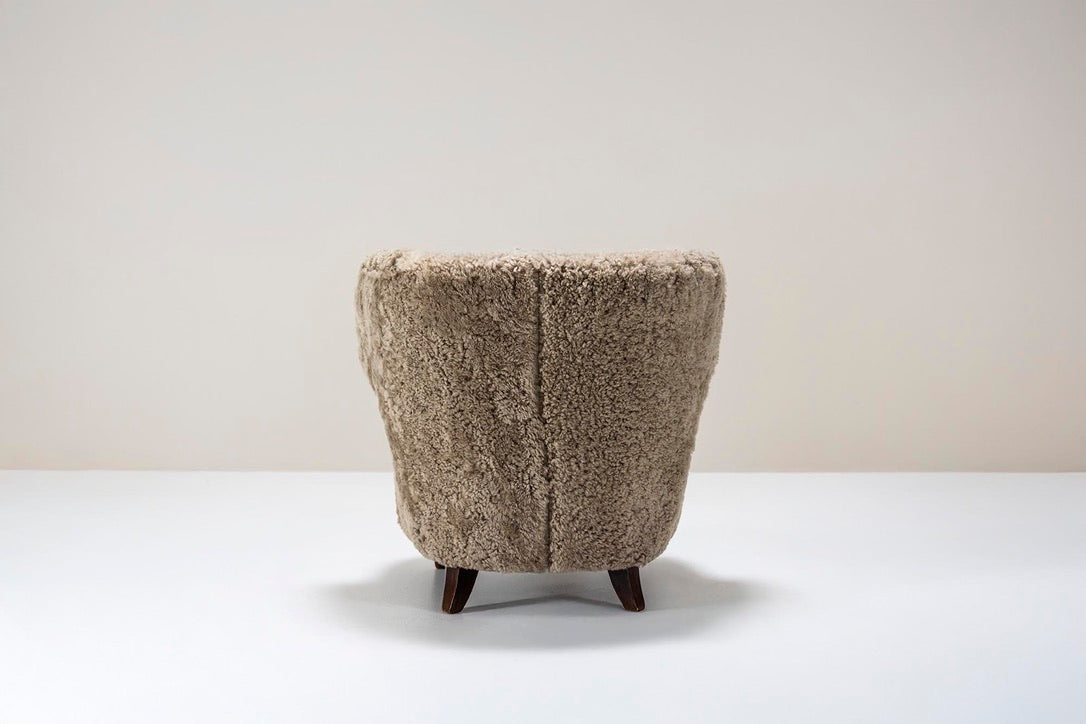 Set_of_2_Lounge_Chairs_Carl-Johan_Boman,_Sheepskin_And_Wood,_1940s_Finland