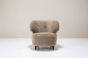 Set_of_2_Lounge_Chairs_Carl-Johan_Boman,_Sheepskin_And_Wood,_1940s_Finland