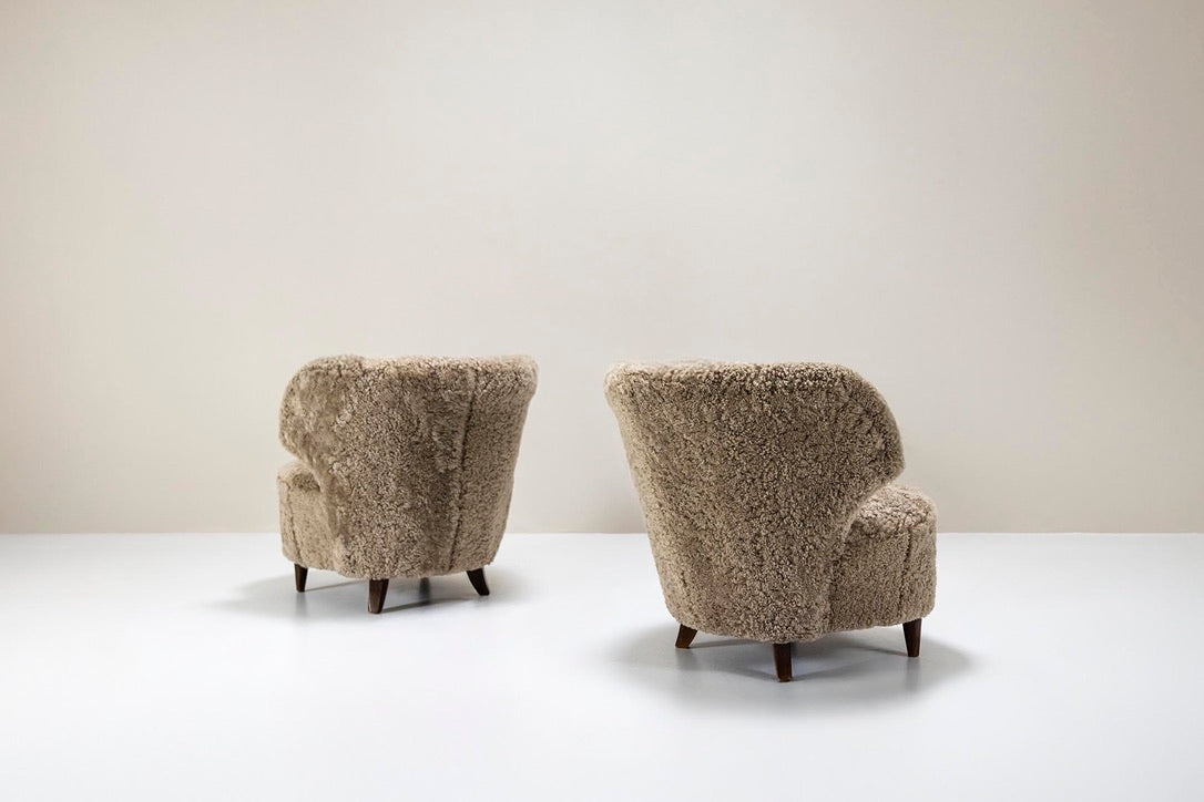 Set_of_2_Lounge_Chairs_Carl-Johan_Boman,_Sheepskin_And_Wood,_1940s_Finland