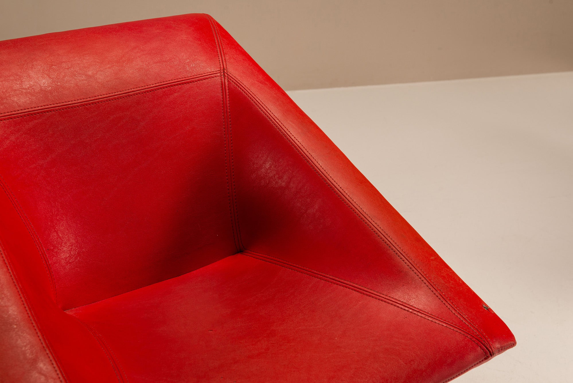 Set_of_2_Sculptural_Lounge_Chairs,_Metal_And_Red_Leather,_1960s,_Italy