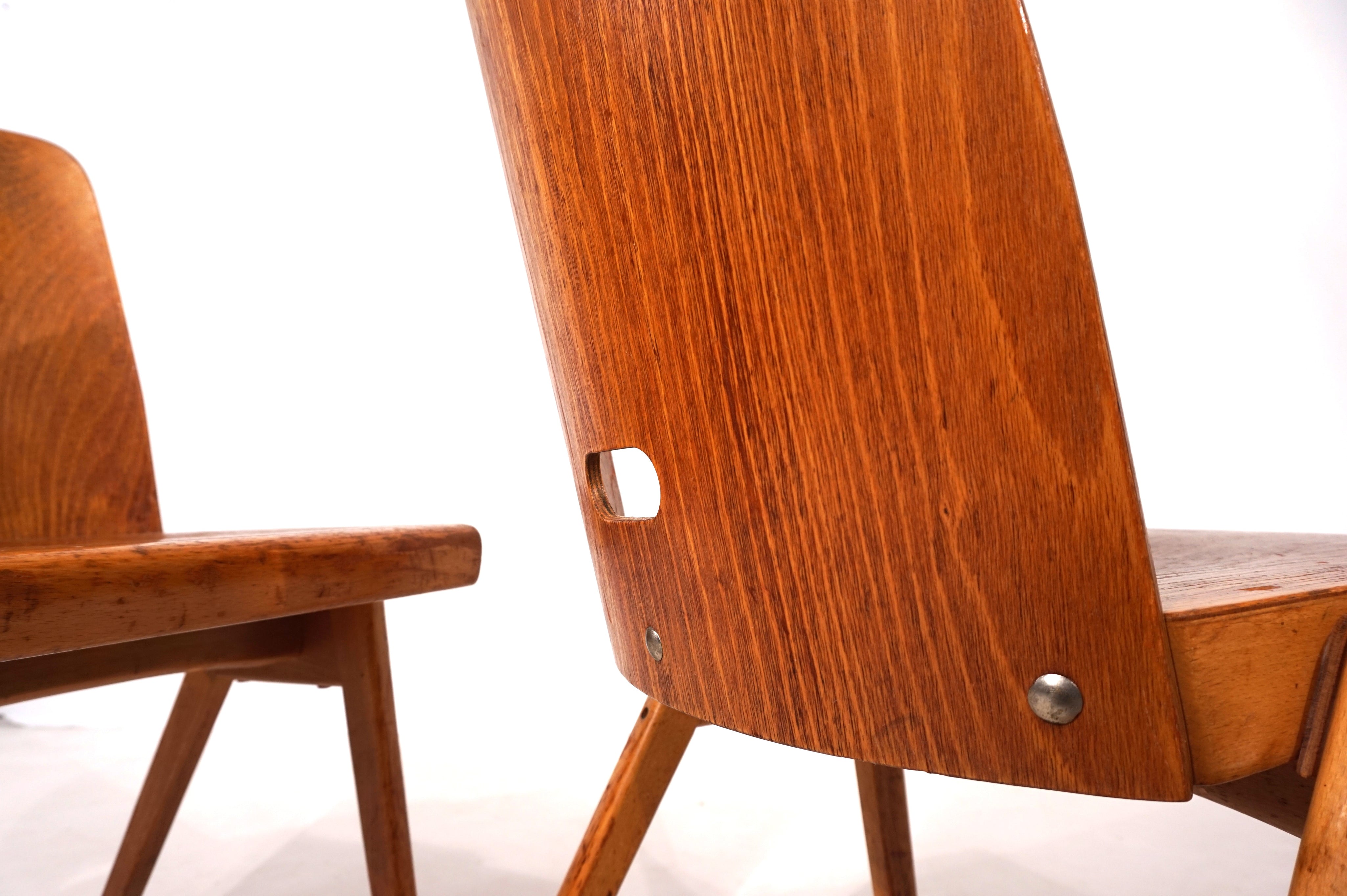 Set_of_2_stackable_plywood_dining_chairs_from_1960